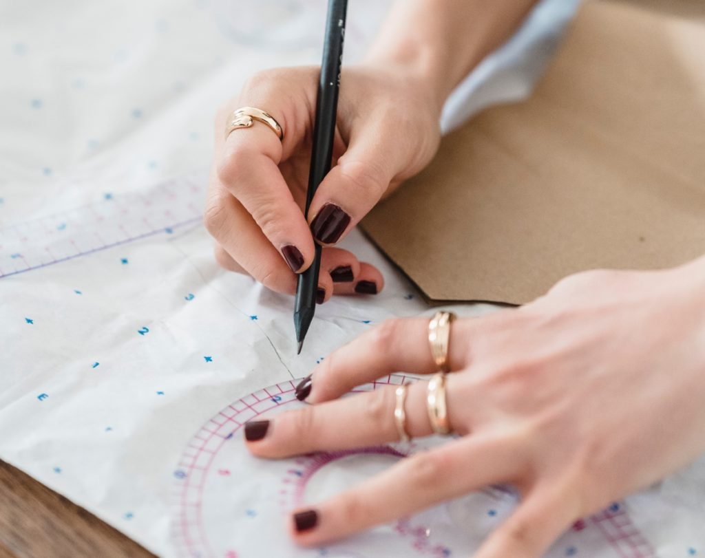 Woman's Hands Making A Pattern